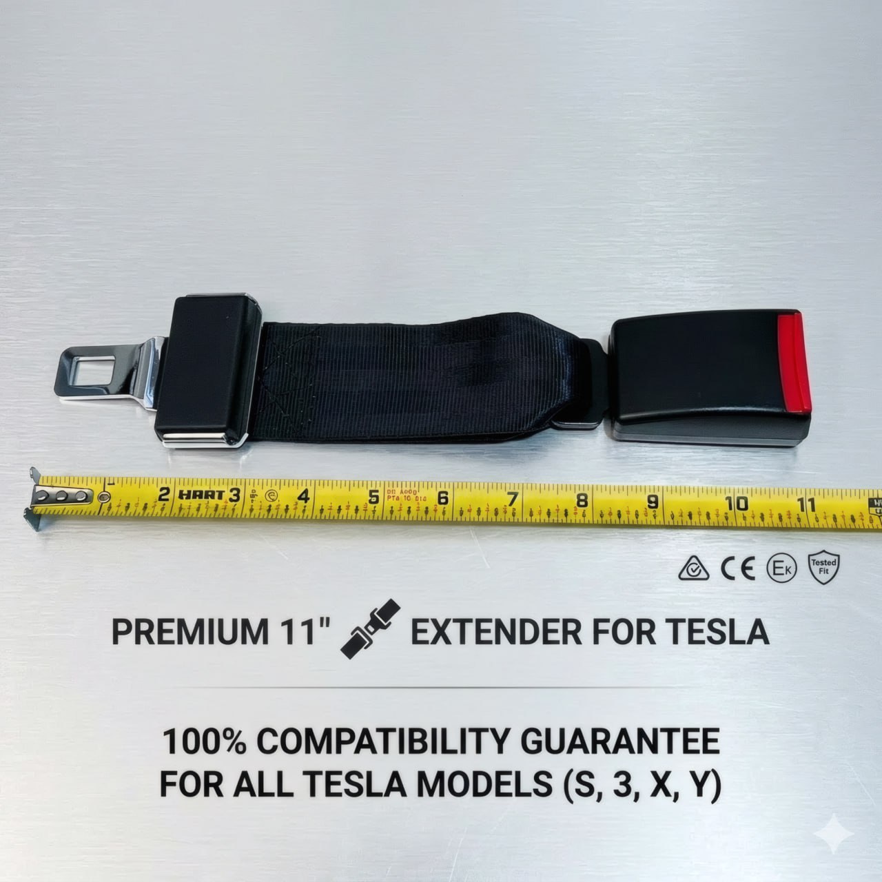 Tesla seat belt extender size reference showing 11 inches